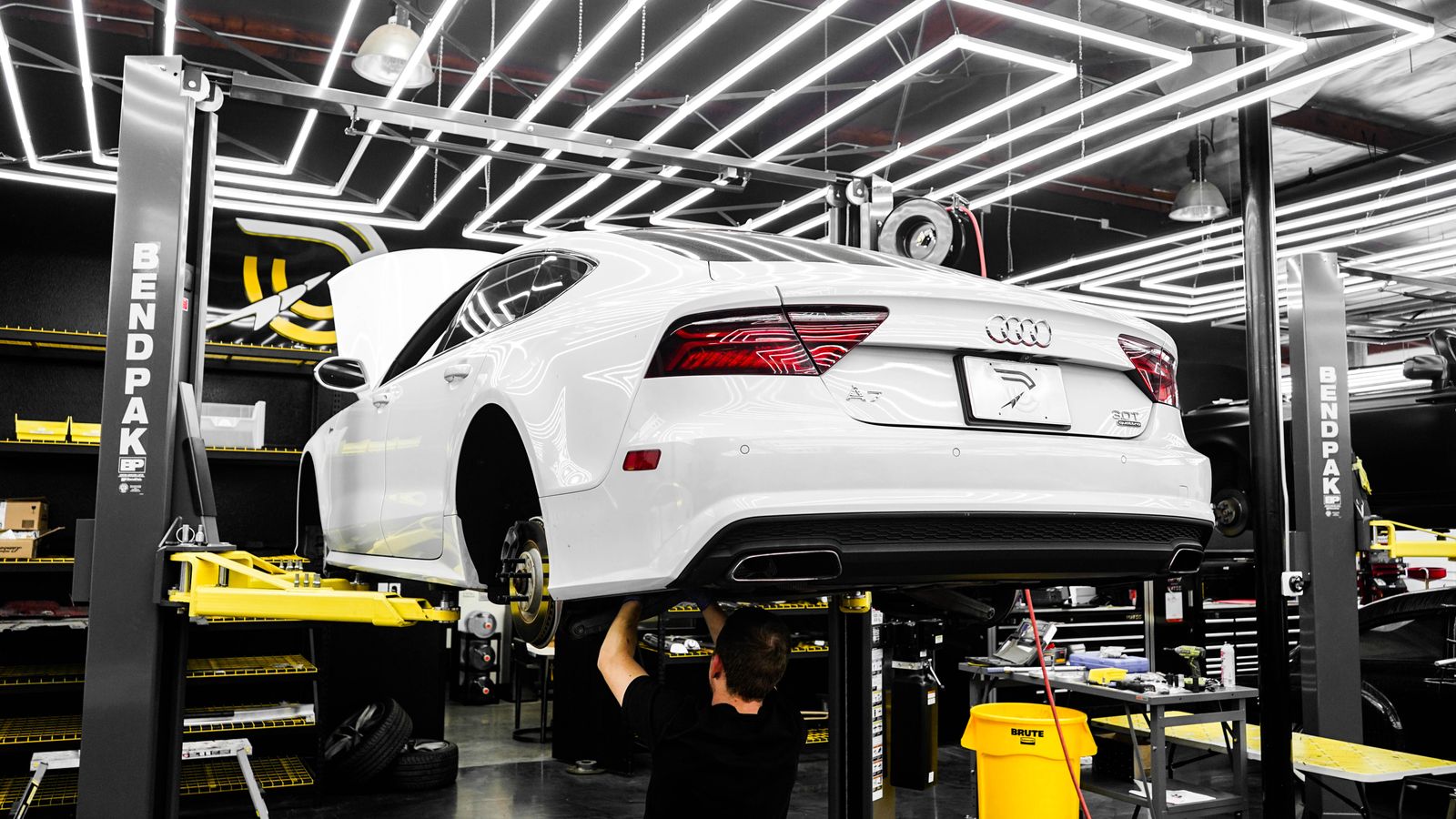 Vehicle being serviced in a clean repair bay