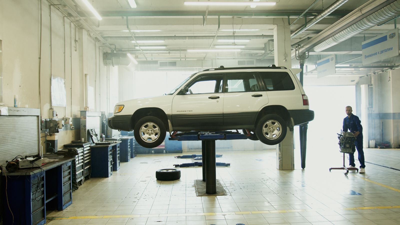 Vehicle raised in an auto repair bay